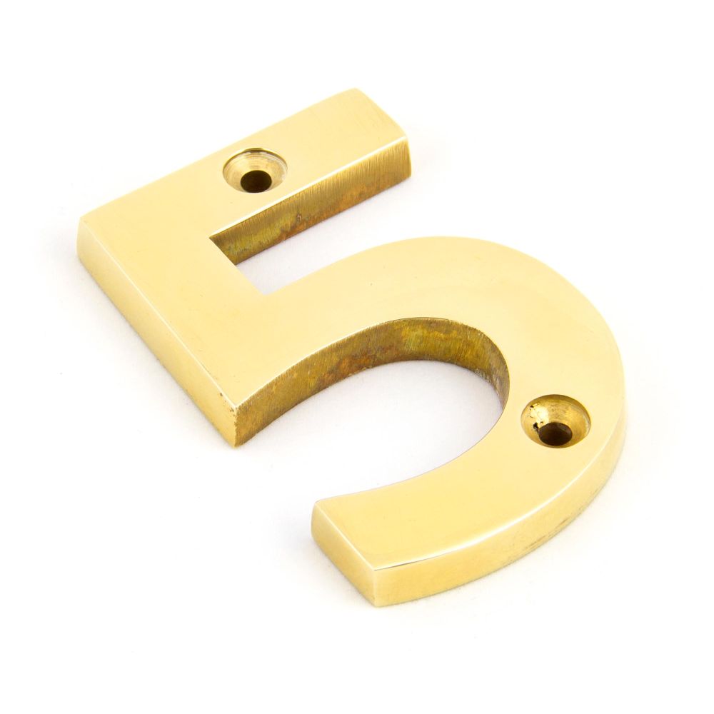 This is an image showing From The Anvil - Polished Brass Numeral 5 available from trade door handles, quick delivery and discounted prices