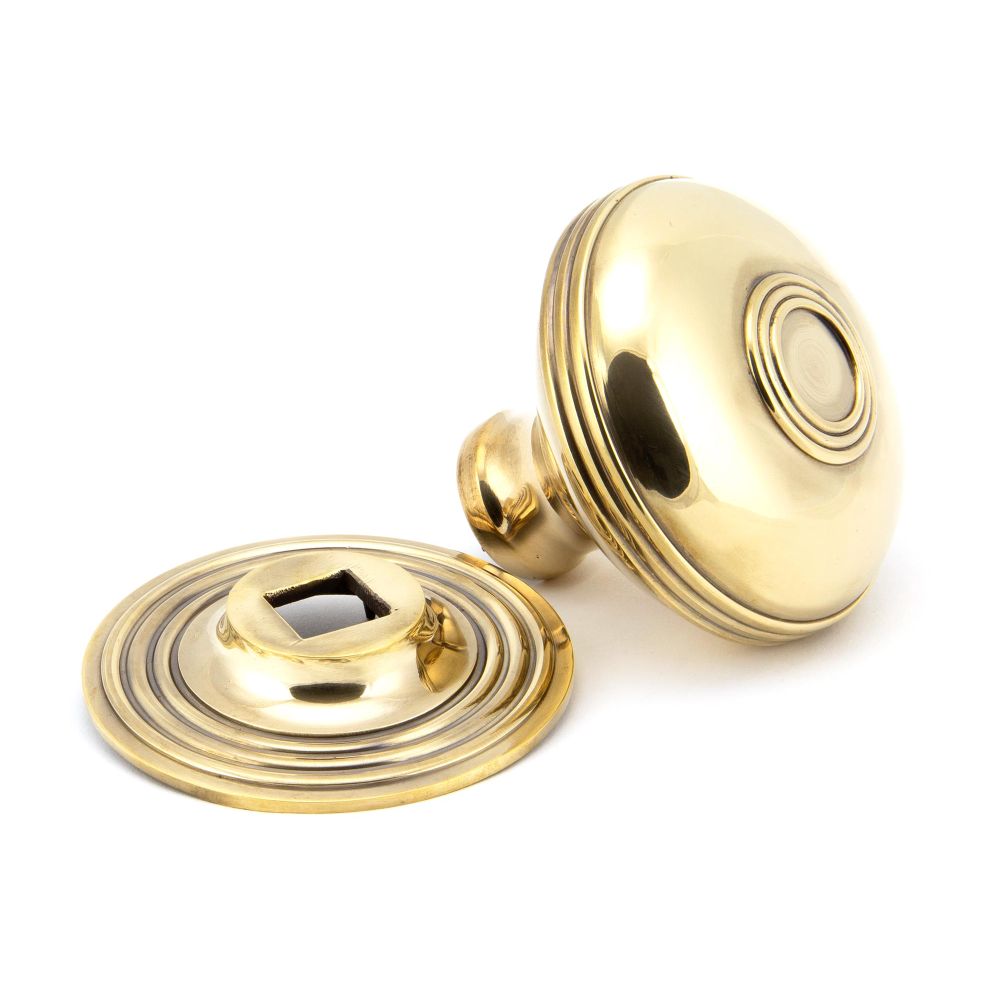 This is an image showing From The Anvil - Aged Brass Prestbury Centre Door Knob available from trade door handles, quick delivery and discounted prices