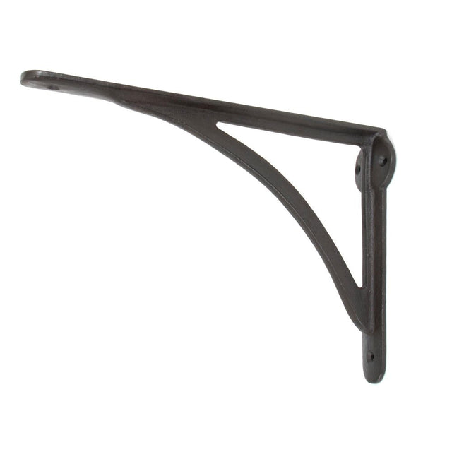 This is an image showing From The Anvil - Beeswax 10'' x 7'' Curved Shelf Bracket available from trade door handles, quick delivery and discounted prices