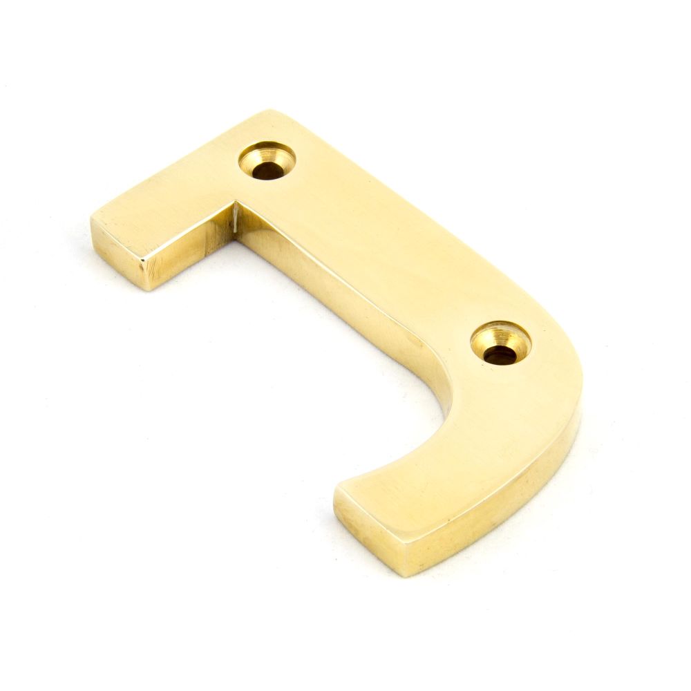 This is an image showing From The Anvil - Polished Brass Letter J available from trade door handles, quick delivery and discounted prices