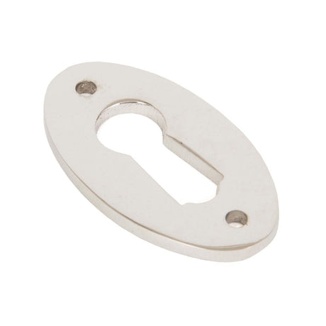 This is an image showing From The Anvil - Polished Nickel Oval Escutcheon available from trade door handles, quick delivery and discounted prices