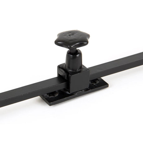 This is an image showing From The Anvil - Black 12" Sliding Stay available from trade door handles, quick delivery and discounted prices