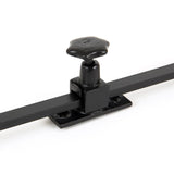 This is an image showing From The Anvil - Black 15" Sliding Stay available from trade door handles, quick delivery and discounted prices