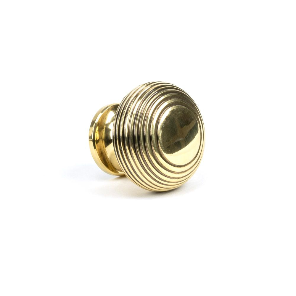 This is an image showing From The Anvil - Aged Brass Beehive Cabinet Knob 40mm available from trade door handles, quick delivery and discounted prices