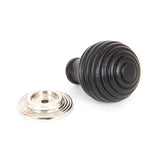 This is an image showing From The Anvil - Ebony and PN Beehive Cabinet Knob 35mm available from trade door handles, quick delivery and discounted prices