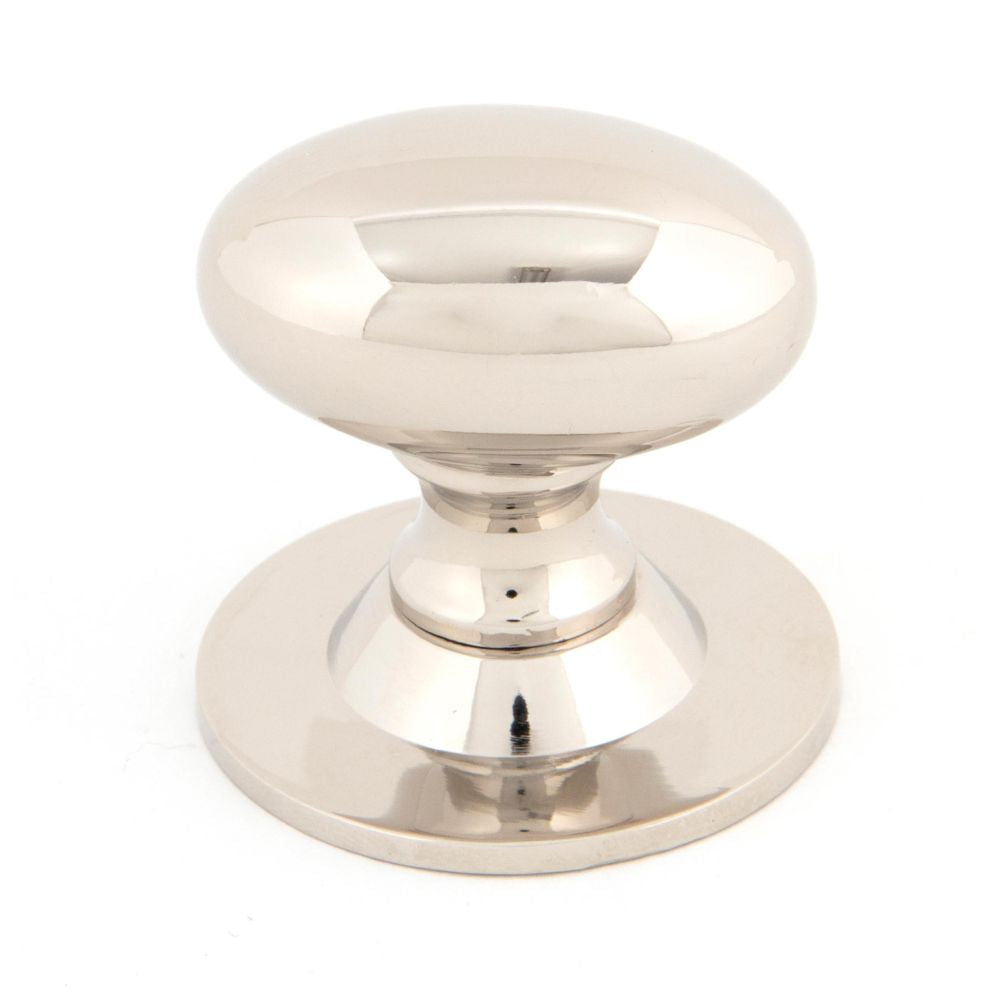 This is an image showing From The Anvil - Polished Nickel Oval Cabinet Knob 40mm available from trade door handles, quick delivery and discounted prices