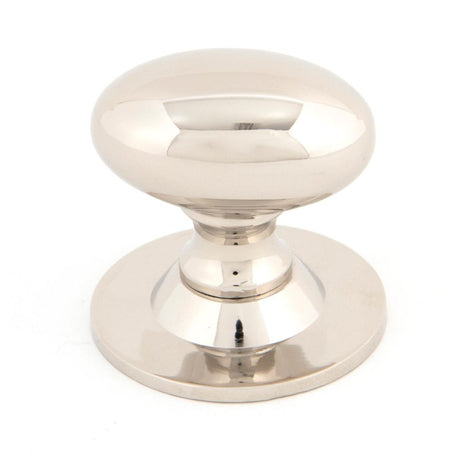 This is an image showing From The Anvil - Polished Nickel Oval Cabinet Knob 40mm available from trade door handles, quick delivery and discounted prices