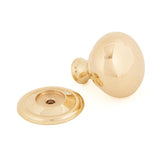 This is an image showing From The Anvil - Polished Brass Mushroom Cabinet Knob 32mm available from trade door handles, quick delivery and discounted prices