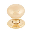 This is an image showing From The Anvil - Polished Brass Mushroom Cabinet Knob 32mm available from trade door handles, quick delivery and discounted prices