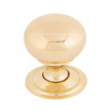 This is an image showing From The Anvil - Polished Brass Mushroom Cabinet Knob 32mm available from trade door handles, quick delivery and discounted prices