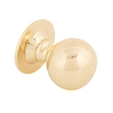 This is an image showing From The Anvil - Polished Brass Ball Cabinet Knob 31mm available from trade door handles, quick delivery and discounted prices