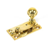 This is an image showing From The Anvil - Polished Brass Prestbury Sash Hook Fastener available from trade door handles, quick delivery and discounted prices