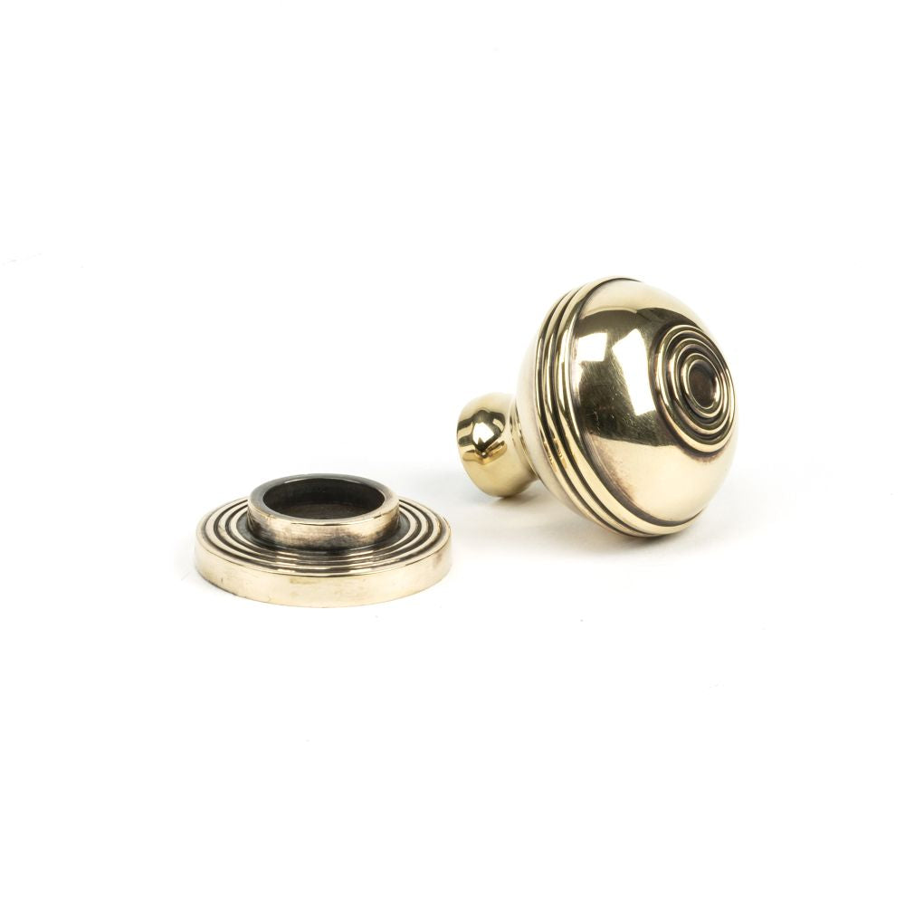 This is an image showing From The Anvil - Aged Brass Prestbury Cabinet Knob 32mm available from trade door handles, quick delivery and discounted prices