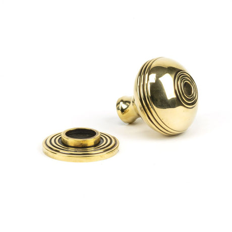 This is an image showing From The Anvil - Aged Brass Prestbury Cabinet Knob 38mm available from trade door handles, quick delivery and discounted prices