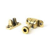 This is an image showing From The Anvil - Aged Brass Brompton Brighton Fastener (Radiused) available from trade door handles, quick delivery and discounted prices