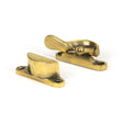 This is an image showing From The Anvil - Aged Brass Fitch Fastener available from trade door handles, quick delivery and discounted prices