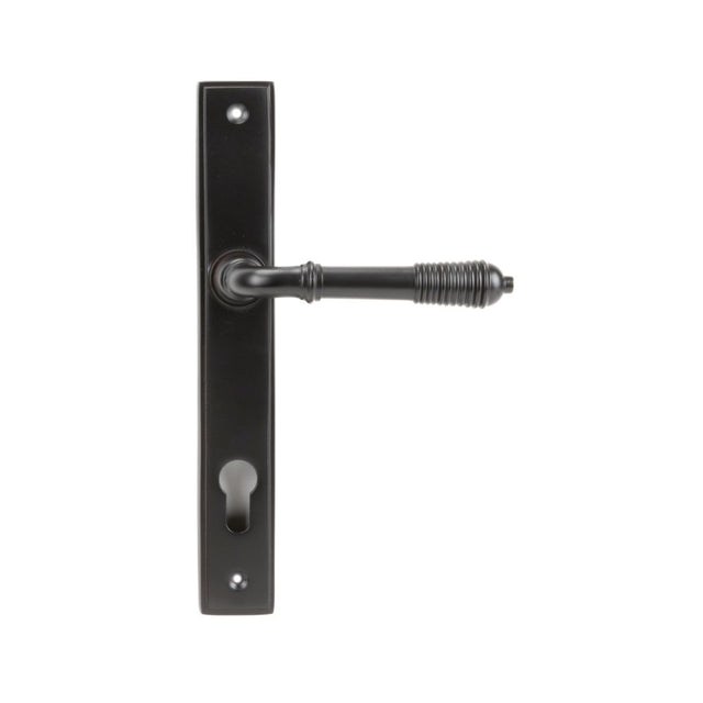 This is an image showing From The Anvil - Aged Bronze Reeded Slimline Lever Espag. Lock Set available from trade door handles, quick delivery and discounted prices