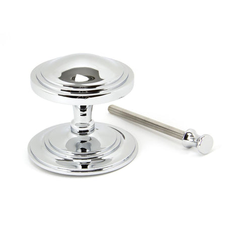 This is an image showing From The Anvil - Polished Chrome Art Deco Centre Door Knob available from trade door handles, quick delivery and discounted prices