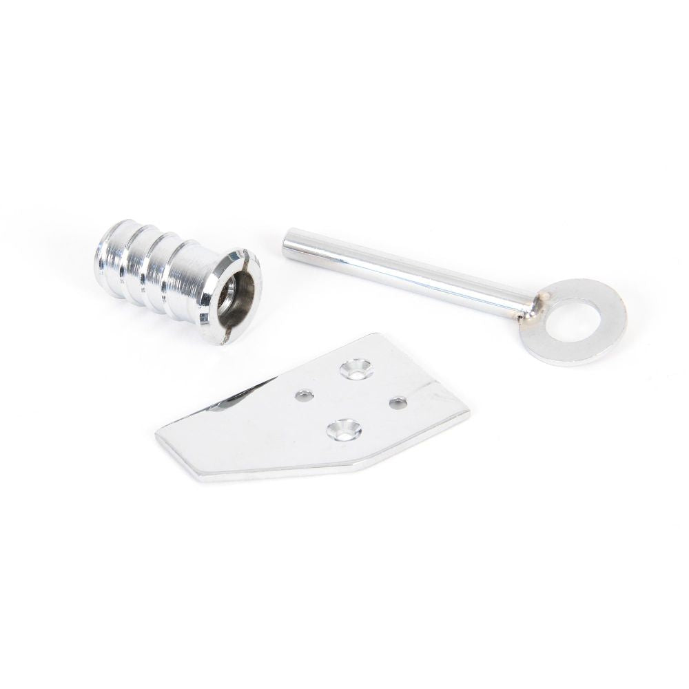 This is an image showing From The Anvil - Polished Chrome Key-Flush Sash Stop available from trade door handles, quick delivery and discounted prices