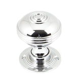 This is an image showing From The Anvil - Polished Chrome 50mm Prestbury Mortice/Rim Knob Set available from trade door handles, quick delivery and discounted prices