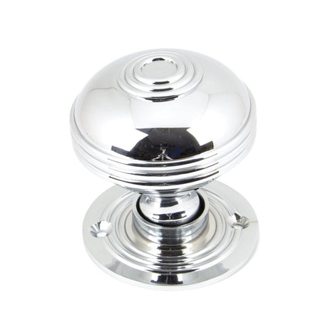 This is an image showing From The Anvil - Polished Chrome 63mm Prestbury Mortice/Rim Knob Set available from trade door handles, quick delivery and discounted prices