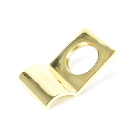 This is an image showing From The Anvil - Polished Brass Rim Cylinder Pull available from trade door handles, quick delivery and discounted prices