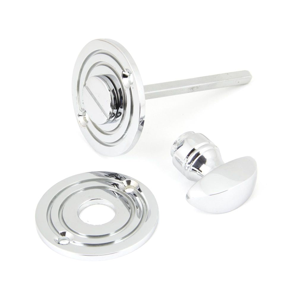 This is an image showing From The Anvil - Polished Chrome Round Bathroom Thumbturn available from trade door handles, quick delivery and discounted prices