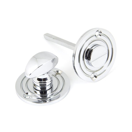 This is an image showing From The Anvil - Polished Chrome Round Bathroom Thumbturn available from trade door handles, quick delivery and discounted prices