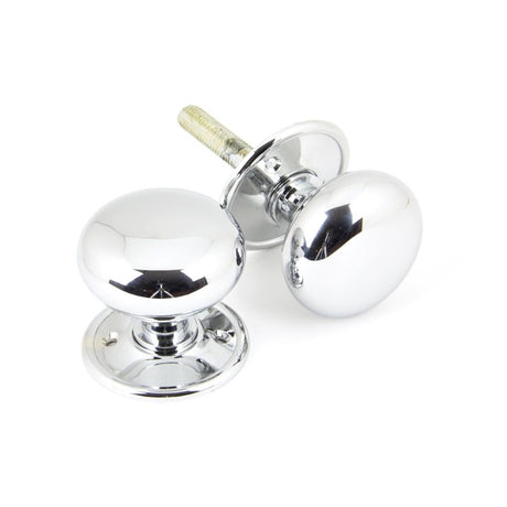This is an image showing From The Anvil - Polished Chrome Mushroom Mortice/Rim Knob Set available from trade door handles, quick delivery and discounted prices