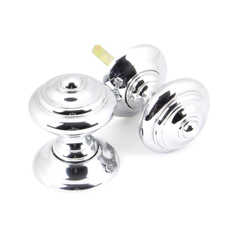 This is an image showing From The Anvil - Polished Chrome Elmore Concealed Mortice Knob Set available from trade door handles, quick delivery and discounted prices