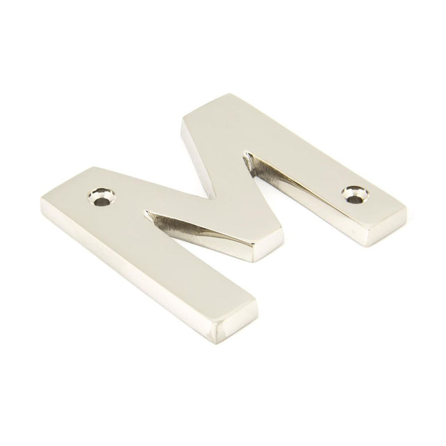 This is an image showing From The Anvil - Polished Nickel Letter M available from trade door handles, quick delivery and discounted prices