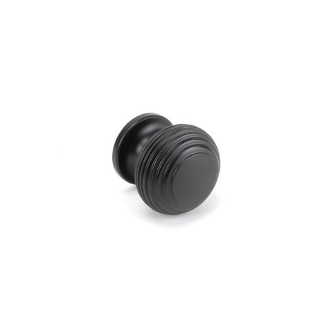 This is an image showing From The Anvil - Aged Bronze Beehive Cabinet Knob 30mm available from trade door handles, quick delivery and discounted prices