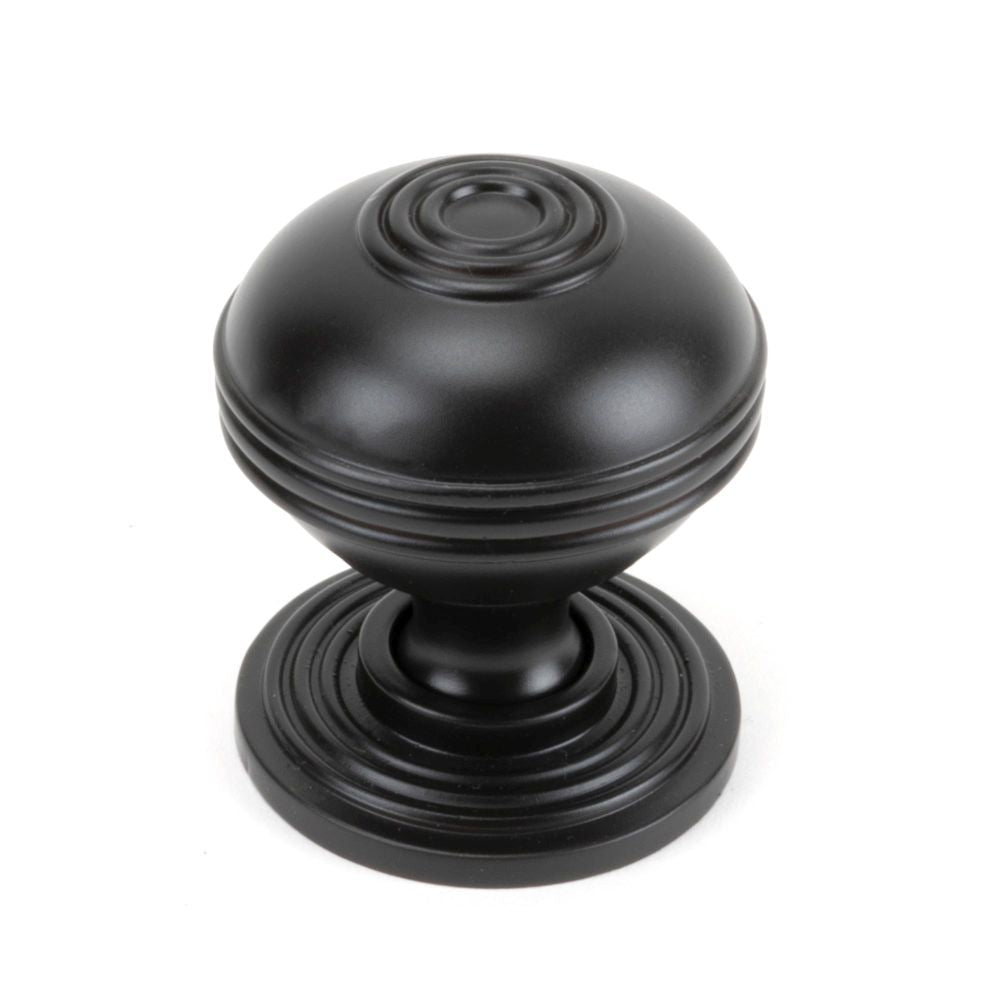 This is an image showing From The Anvil - Aged Bronze Prestbury Cabinet Knob 38mm available from trade door handles, quick delivery and discounted prices