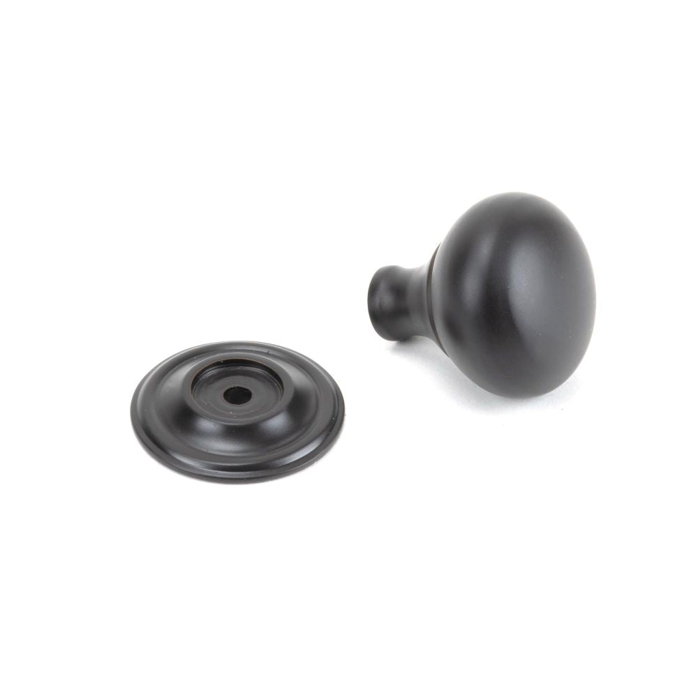 This is an image showing From The Anvil - Aged Bronze Mushroom Cabinet Knob 32mm available from trade door handles, quick delivery and discounted prices