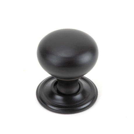 This is an image showing From The Anvil - Aged Bronze Mushroom Cabinet Knob 32mm available from trade door handles, quick delivery and discounted prices