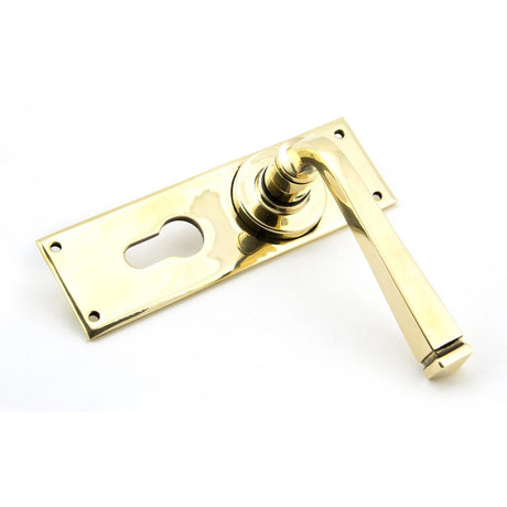 This is an image showing From The Anvil - Aged Brass Avon Lever Euro Lock Set available from trade door handles, quick delivery and discounted prices