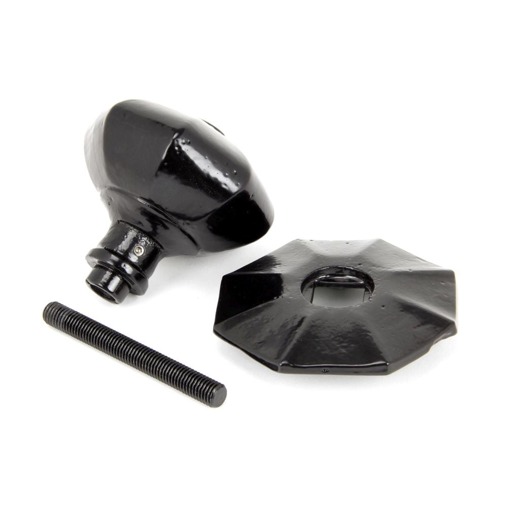 This is an image showing From The Anvil - Black Octagonal Centre Door Knob - Internal available from trade door handles, quick delivery and discounted prices