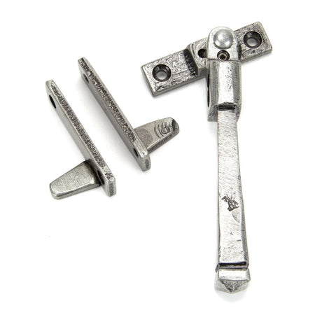 This is an image showing From The Anvil - Pewter Night-Vent Locking Avon Fastener available from trade door handles, quick delivery and discounted prices