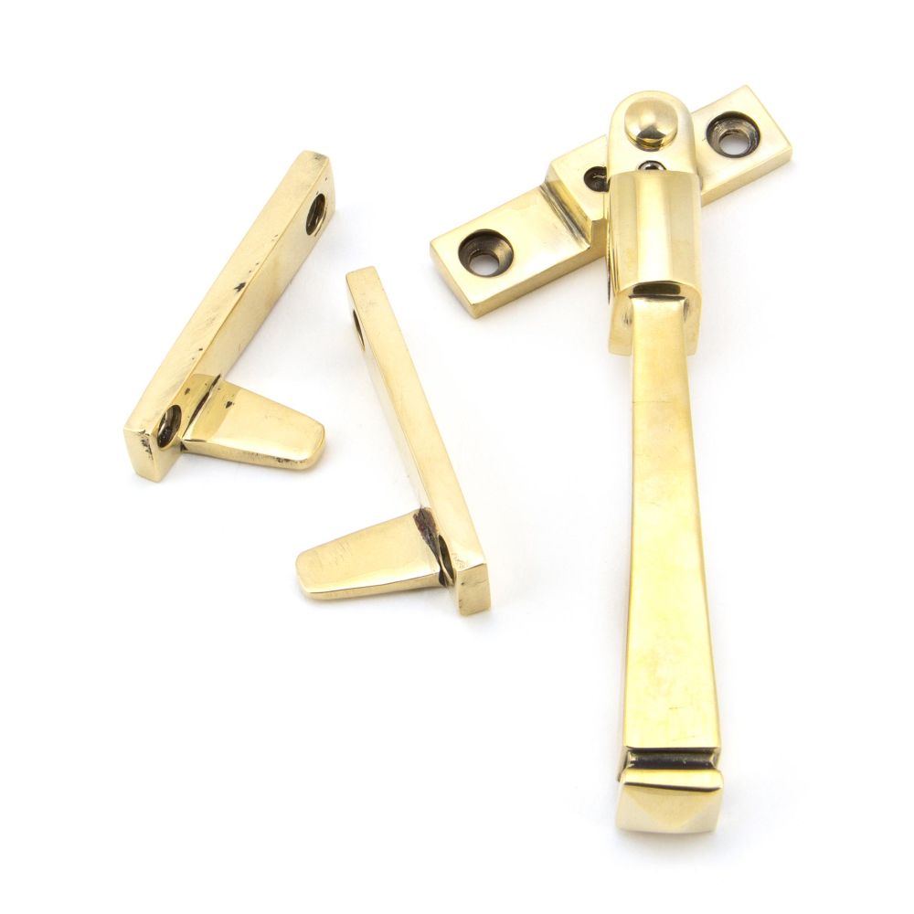 This is an image showing From The Anvil - Aged Brass Night-Vent Locking Avon Fastener available from trade door handles, quick delivery and discounted prices