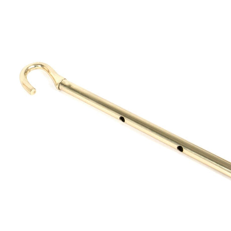 This is an image showing From The Anvil - Lacquered Brass 1-2m Telescopic Window Winder available from trade door handles, quick delivery and discounted prices