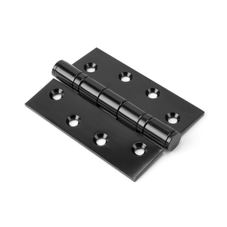 This is an image showing From The Anvil - Black 4" Ball Bearing Butt Hinge (pair) available from trade door handles, quick delivery and discounted prices