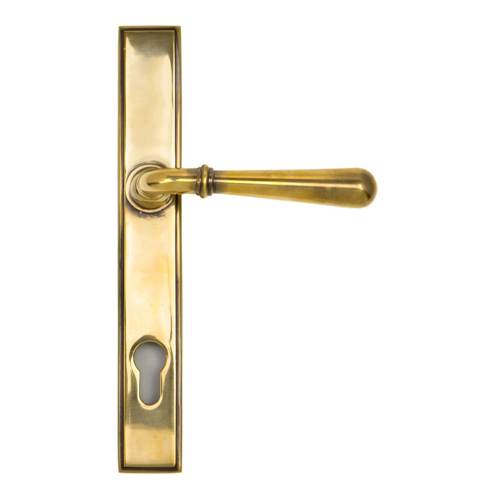 This is an image showing From The Anvil - Aged Brass Newbury Slimline Lever Espag. Lock Set available from trade door handles, quick delivery and discounted prices