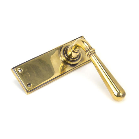 This is an image showing From The Anvil - Aged Brass Newbury Lever Latch Set available from trade door handles, quick delivery and discounted prices