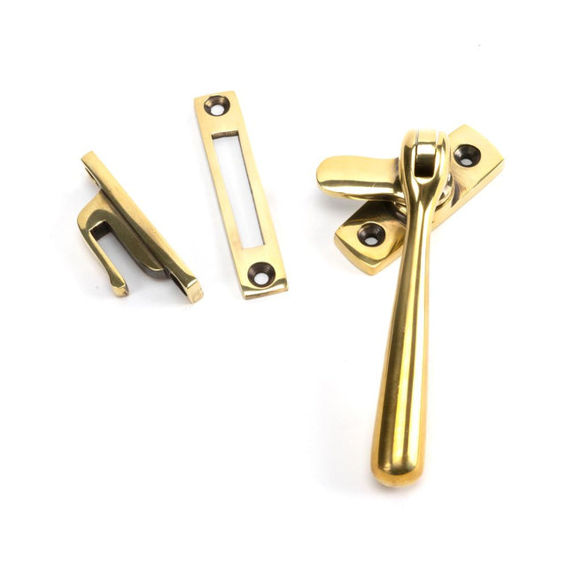 This is an image showing From The Anvil - Aged Brass Locking Newbury Fastener available from trade door handles, quick delivery and discounted prices