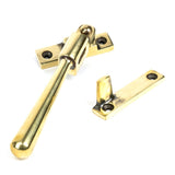 This is an image showing From The Anvil - Aged Brass Night-Vent Locking Newbury Fastener available from trade door handles, quick delivery and discounted prices