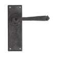 This is an image showing From The Anvil - External Beeswax Avon Lever Latch Set available from trade door handles, quick delivery and discounted prices