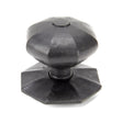 This is an image showing From The Anvil - External Beeswax Octagonal Centre Door Knob available from trade door handles, quick delivery and discounted prices