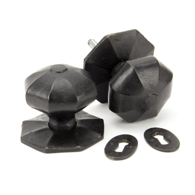 This is an image showing From The Anvil - External Beeswax Large Octagonal Mortice/Rim Knob Set available from trade door handles, quick delivery and discounted prices