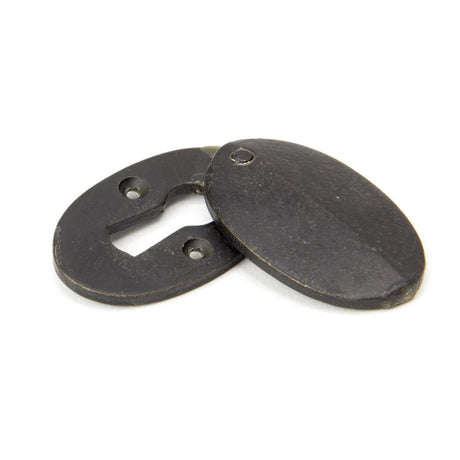 This is an image showing From The Anvil - External Beeswax Oval Escutcheon & Cover available from trade door handles, quick delivery and discounted prices