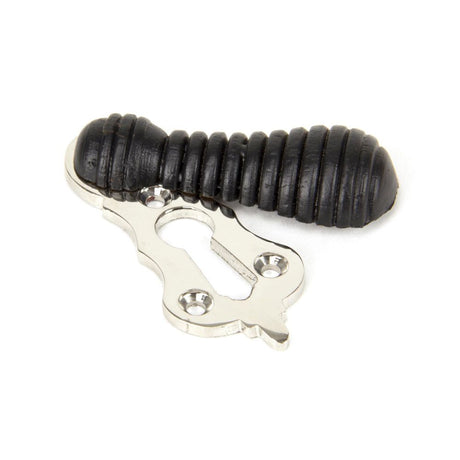 This is an image showing From The Anvil - Ebony & Polished Nickel Beehive Escutcheon available from trade door handles, quick delivery and discounted prices